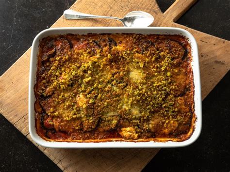Ina gartens eggplant parm - Preheat the oven to 400 degrees F. Melt the butter in a very large (12-inch) saute pan and cook the onions over low heat for 20 minutes, or until tender but not browned. Add the zucchini and cook ...